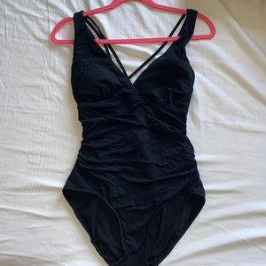 A black one piece bathing suit